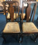 Four Queen Anne style dining chairs