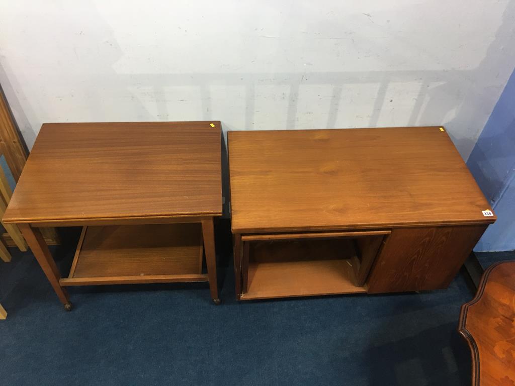 Teak fold over trolley and a teak fold over nest of tables