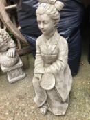 Concrete figure of a Geisha