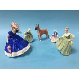 A Royal Doulton 'CH Warlord of Mazelaine', HN 2643 and four Royal Doulton Ladies (5)