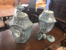 A pair of outside hanging lanterns