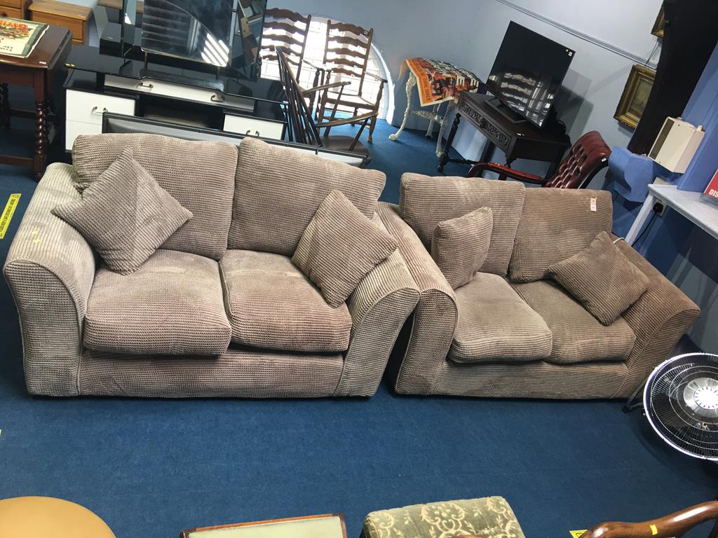 Pair of light brown two seater settees