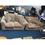 Pair of light brown two seater settees