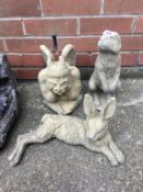 Three various garden figures