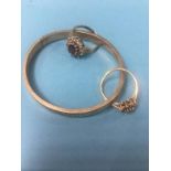 A silver bangle and two 9ct rings, 5.4g