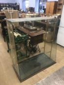 A glass shop display cabinet