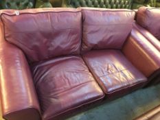 Two good quality leather purple settees, (one three seater and two seater) (2)