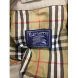 Burberry trench coat and various furs
