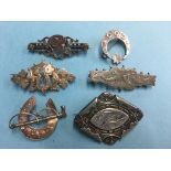 Six silver brooches