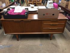 A small teak sideboard