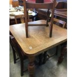 Oak drawer leaf table and four chairs