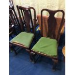 Four Queen Anne style chairs