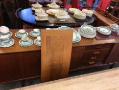 A long teak sideboard