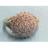 A 9ct diamond cluster ring, approx. 1ct total, size P/Q, 4.4g