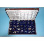 A blue velvet jewellery box and contents