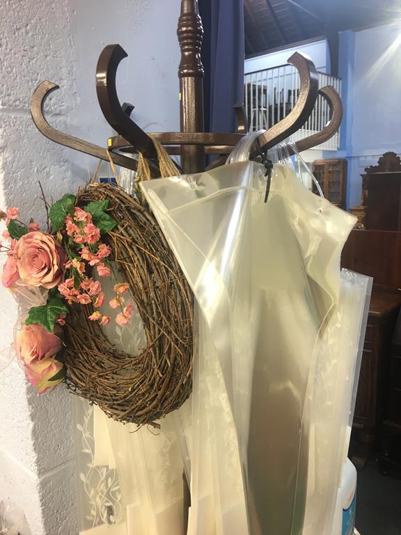 Coat stand and flower carrier bags