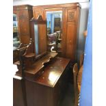 An Edwardian mirror door wardrobe, a marble and tiled back washstand and a dressing chest