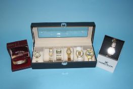 Quantity of dress wristwatches