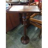 A 19th century mahogany rectangular top pedestal table