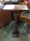 A 19th century mahogany rectangular top pedestal table