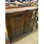 Two walnut china cabinets