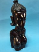 An African carved hardwood bust of a female