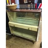 A 1960s melamine retro china cabinet and a sideboard