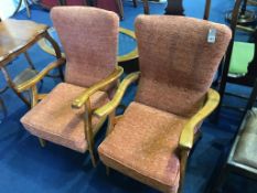 A pair of reclining armchairs