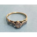An 18ct diamond mounted ring, central stone approx. 0.25ct