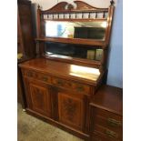 An Edwardian mirror back sideboard