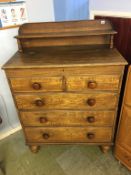 A Victorian pine chest of drawers, the top rising to reveal a blanket chest, below two long drawers,