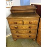 A Victorian pine chest of drawers, the top rising to reveal a blanket chest, below two long drawers,