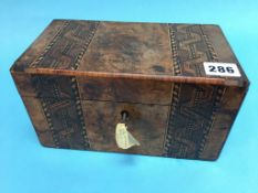 A walnut tea caddy