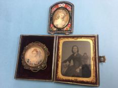 A mosaic miniature frame, miniature buckle and a leather bound picture wallet