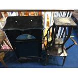 An Edwardian music cabinet, a Windsor stick back chair and a small carved table