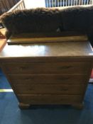 An oak chest of drawers