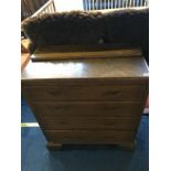 An oak chest of drawers