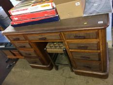 A mahogany pedestal desk