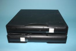 Two Guernsey stamp albums
