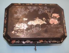 Oriental lacquered jewellery box, decorated with inlaid mother of pearl