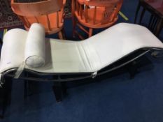 A modern Corbusier style white leather chaise