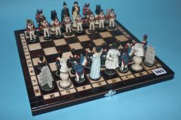 A chessboard and military figure chess pieces