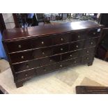 A set of 19th century mahogany herb drawers, having an arrangement of 19 drawers, 83cm wide, 22cm