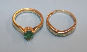 Two 18ct emerald mounted rings, 8.4 grams