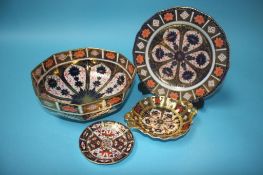 A Royal Crown Derby Imari octagonal bowl, a side plate and two dishes (4)