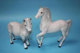 Two Beswick dapple grey ponies