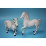 Two Beswick dapple grey ponies