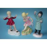 Three Royal Worcester figures; January, February and March, modelled by Freda G. Doughty