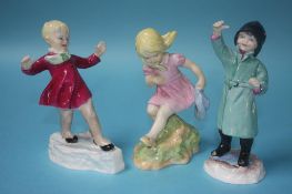 Three Royal Worcester figures; January, February and March, modelled by Freda G. Doughty