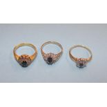 Two 9ct gold sapphire and diamond rings and an 18ct ring, total weight 9.1 grams
